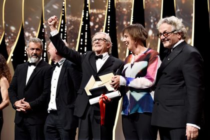 CANNES, FRANCE - MAY 22: Director Ken Loach (C) celebrates with Mel Gibson (L), screenwriter Paul Laverty (2nd L), producer Rebecca O'Brien and director and President of the Jury George Miller after being awarded the Palme d'Or for the movie 'I, Daniel Blake' during the closing ceremony of the annual 69th Cannes Film Festival at Palais des Festivals on May 22, 2016 in Cannes, France. (Photo by Pascal Le Segretain/Getty Images)