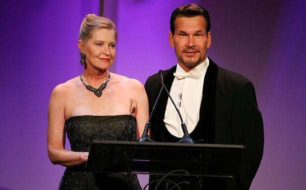 BEVERLY HILLS, CA - FEBRUARY 17: EXCLUSIVE ACCESS. Lisa Niemi (L) and actor Patrick Swayze speak onstage during the 9th annual Costume Designers Guild Awards held at the Beverly Wilshire Hotel on February 17, 2007 in Beverly Hills, California. (Photo by Frazer Harrison/Getty Images for CDG)